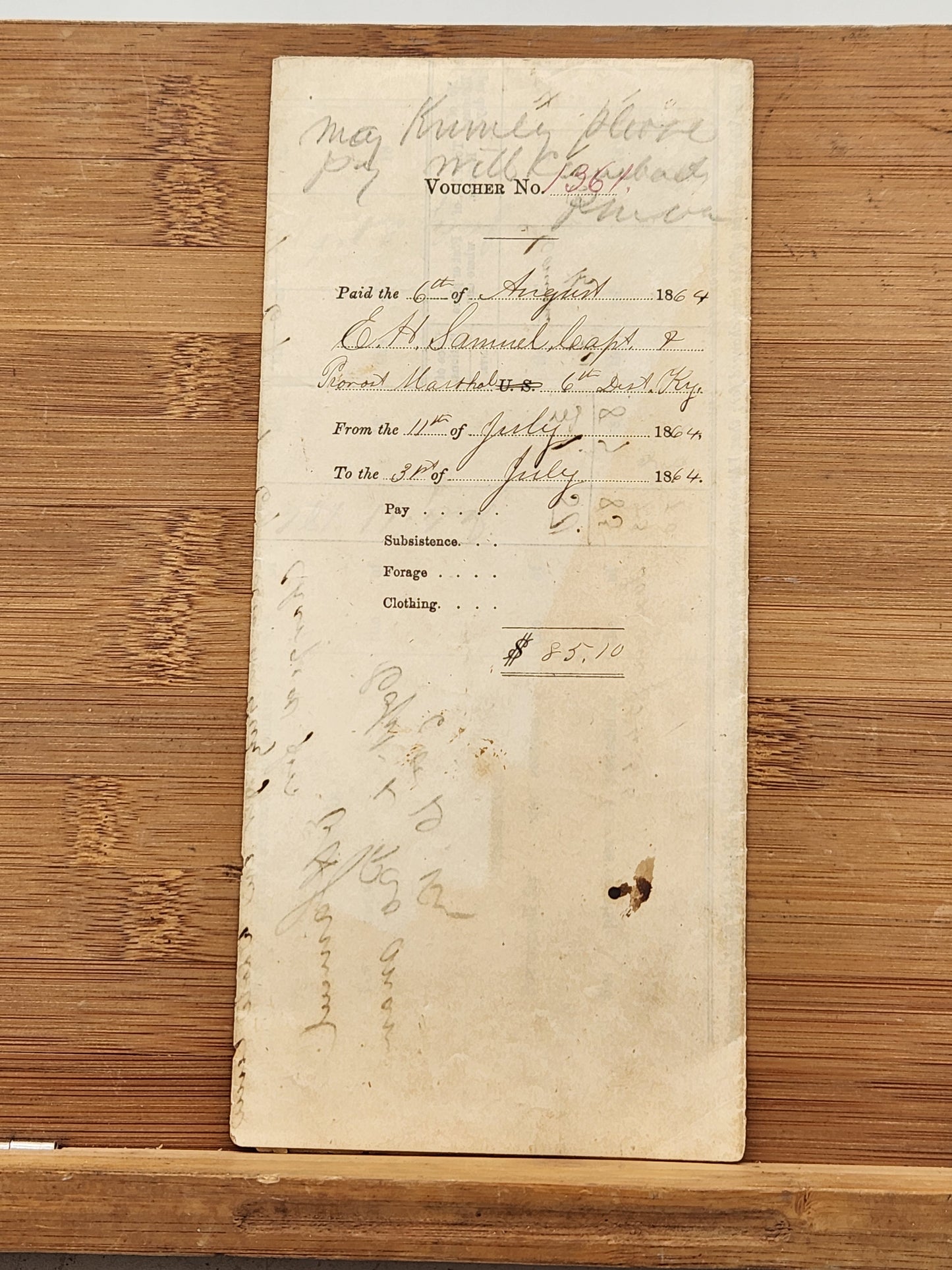 Military pay record from the United States Army, detailing the service and compensation of Captain E.H. Samuel, Provost Marshal of the 6th District