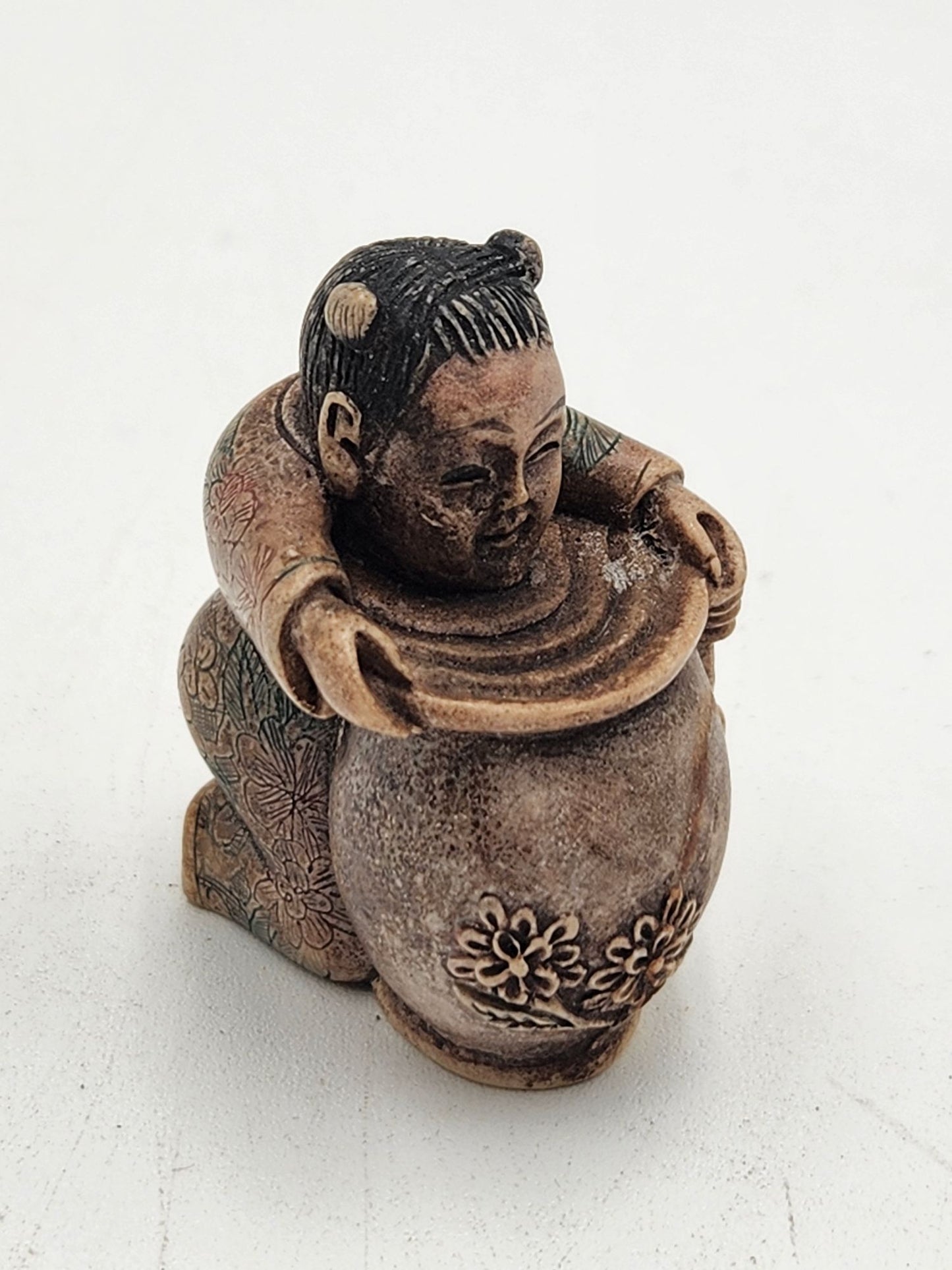 Netsuke Figurine 11 - Person with Flower Pot