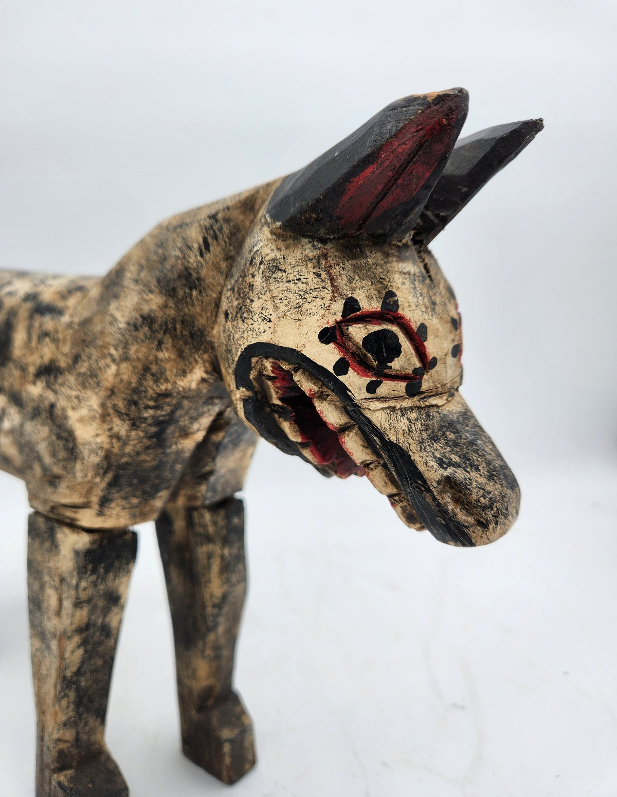 Hand caved wooden hyena/dog