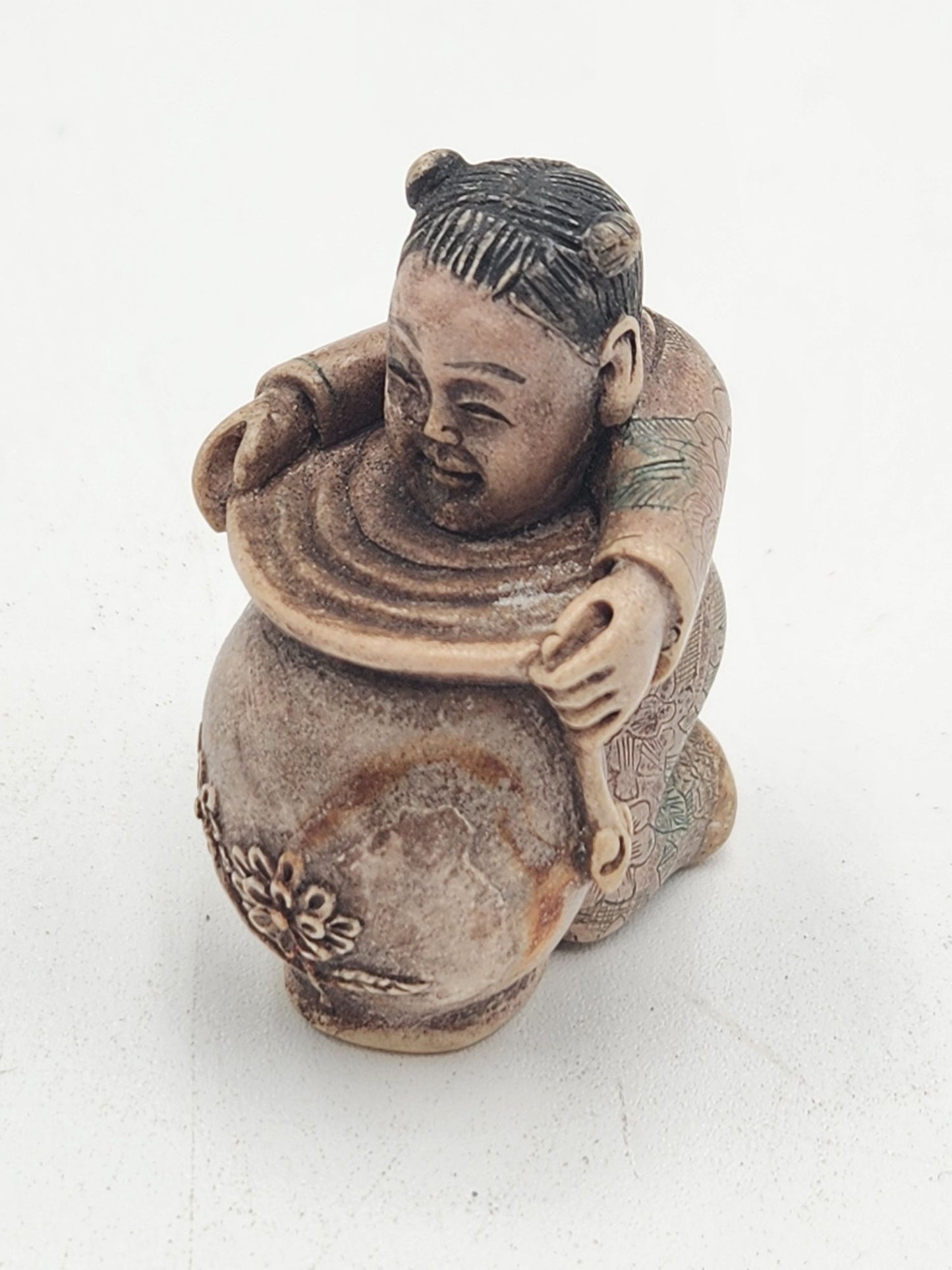 Netsuke Figurine 11 - Person with Flower Pot