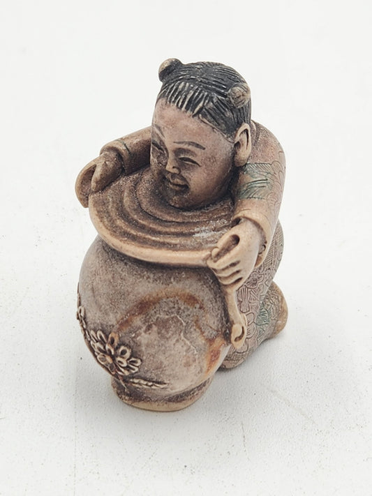 Netsuke Figurine 11 - Person with Flower Pot