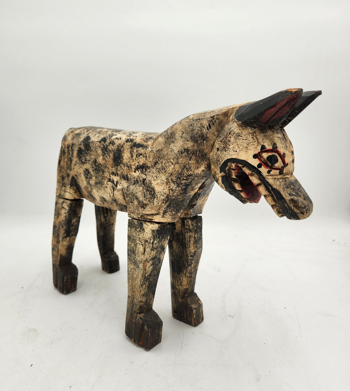 Hand caved wooden hyena/dog