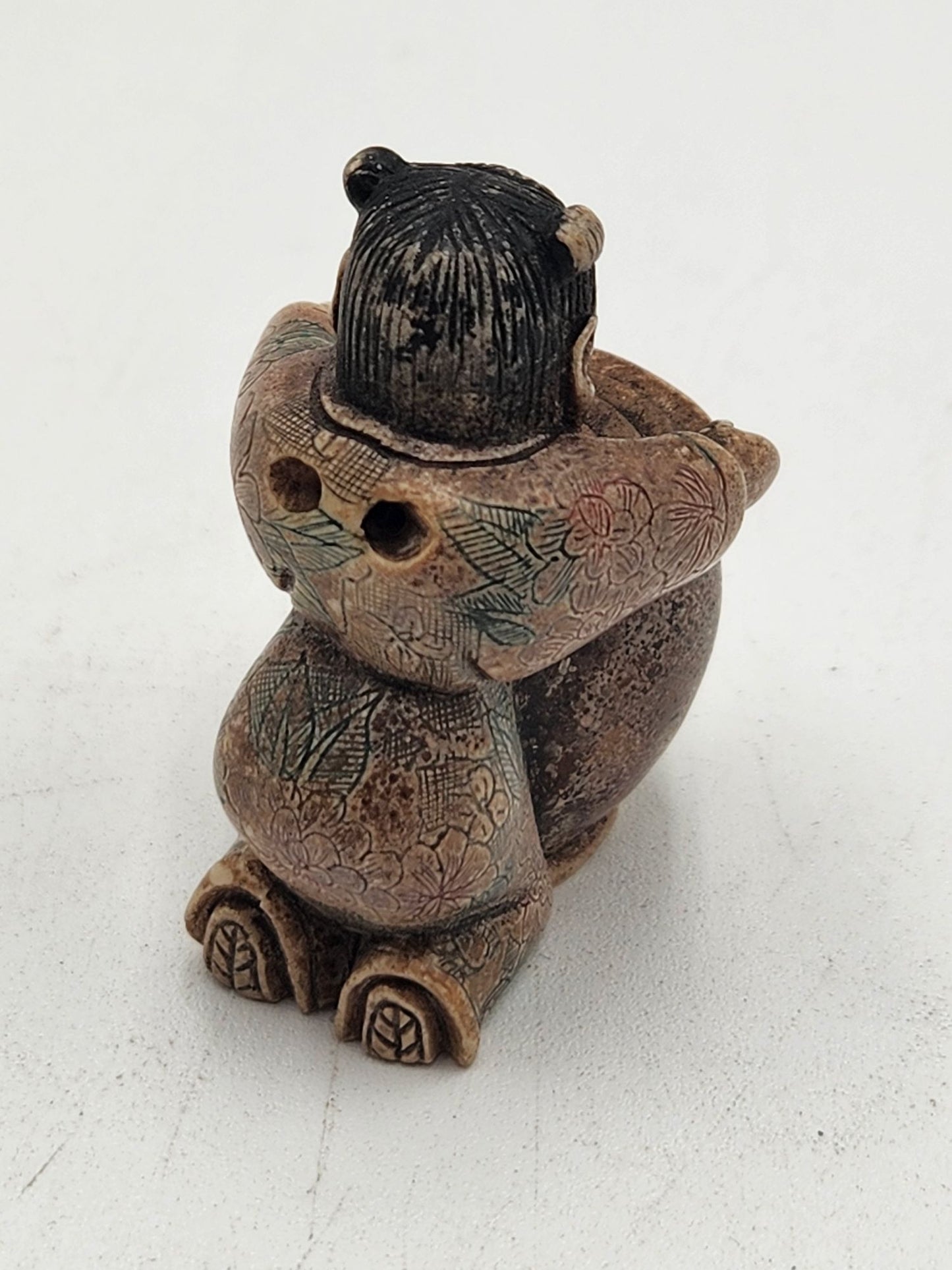 Netsuke Figurine 11 - Person with Flower Pot