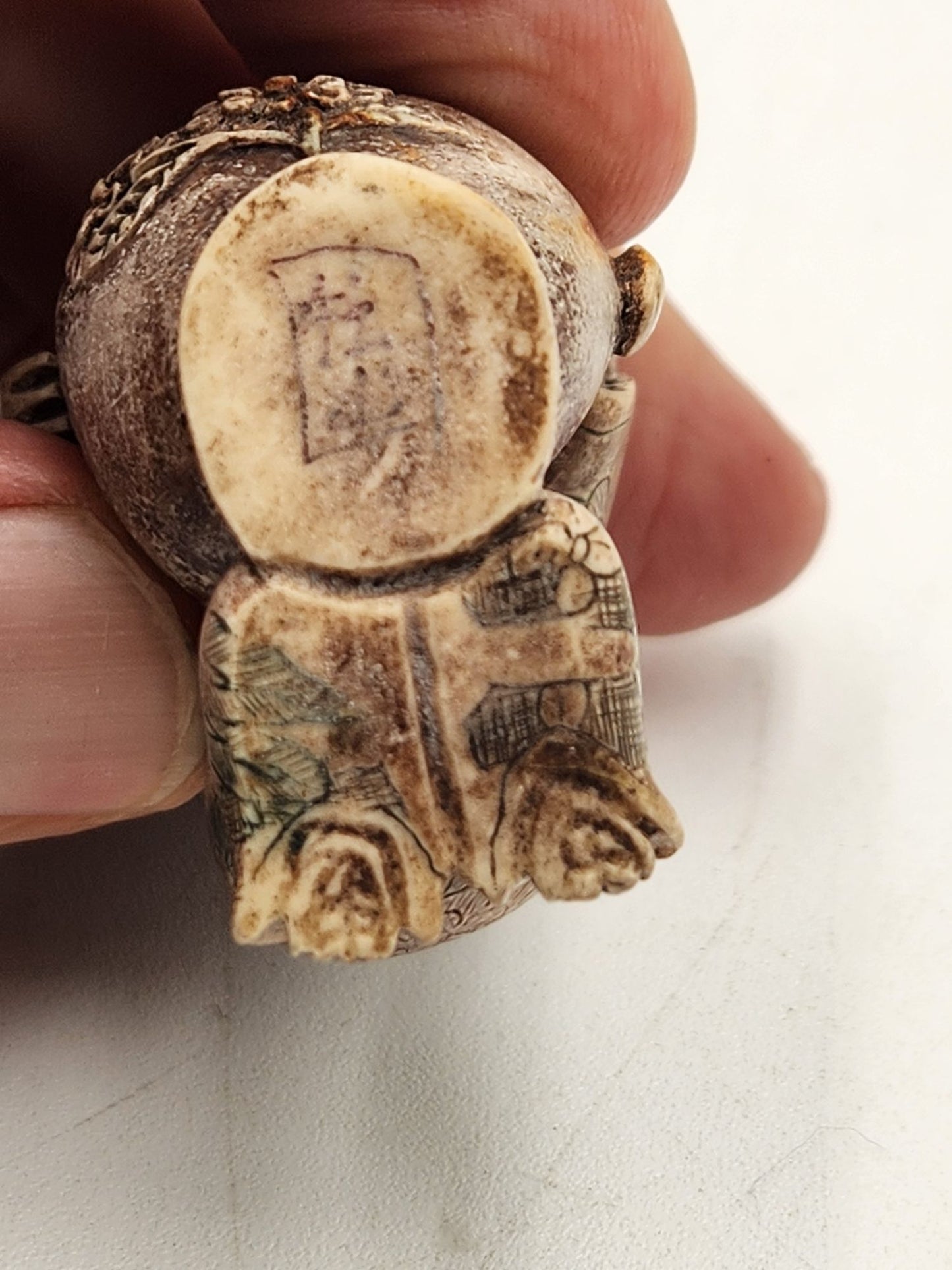 Netsuke Figurine 11 - Person with Flower Pot