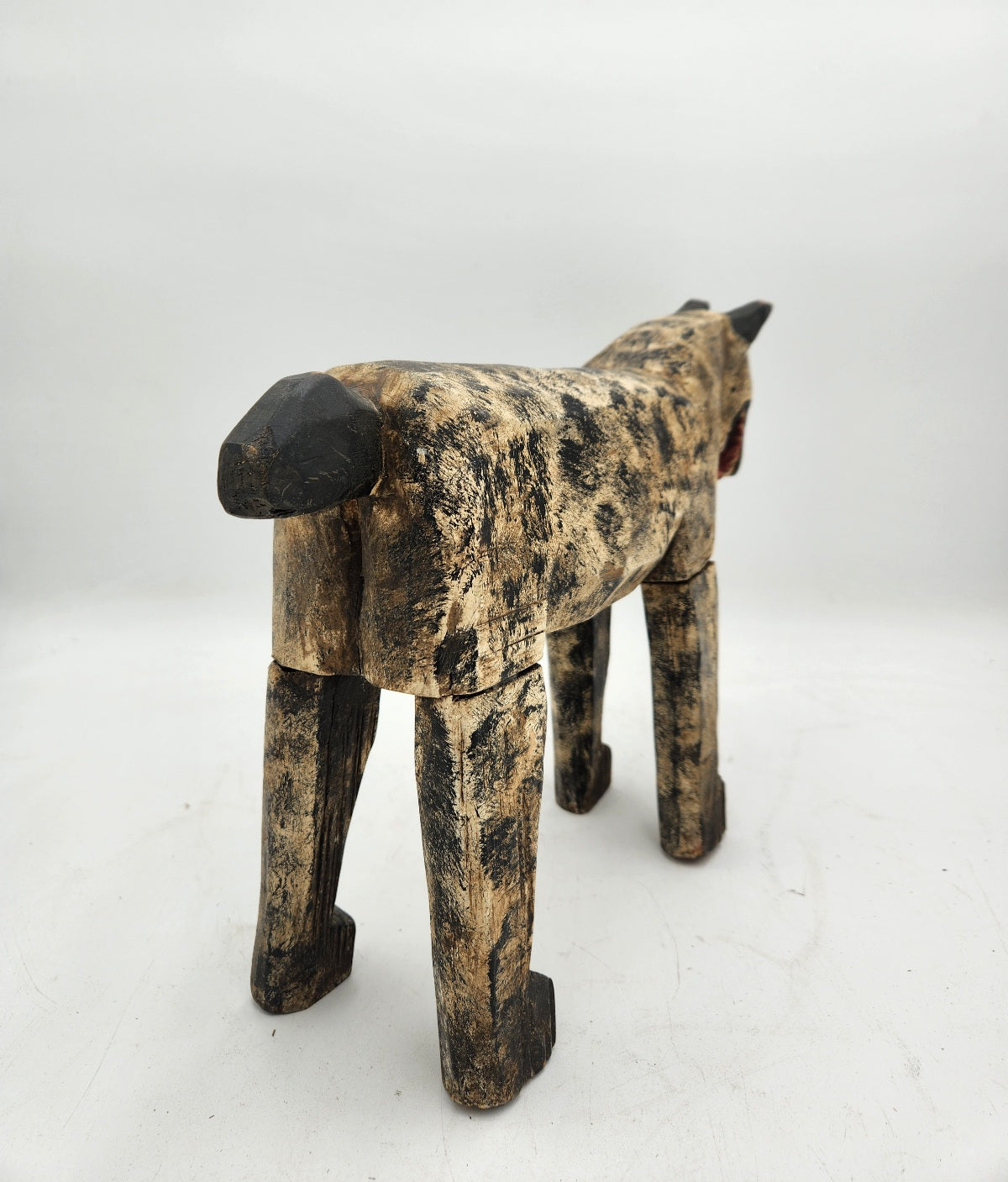 Hand caved wooden hyena/dog