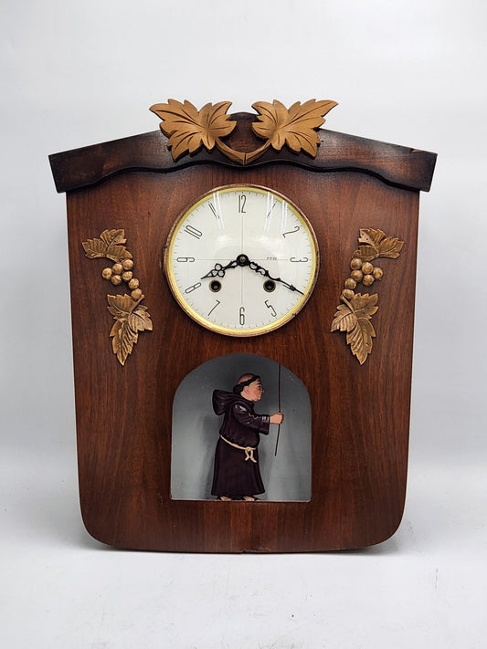 German, 8 days, time and strike, spring brass lever movement animated Monk wall clock