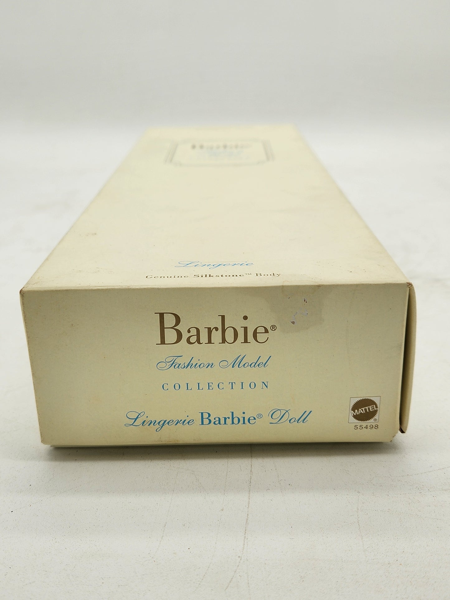 2002 Silkstone Lingerie Barbie redhead edition with original box and accessories. Early Fashion Model Collection collectible.