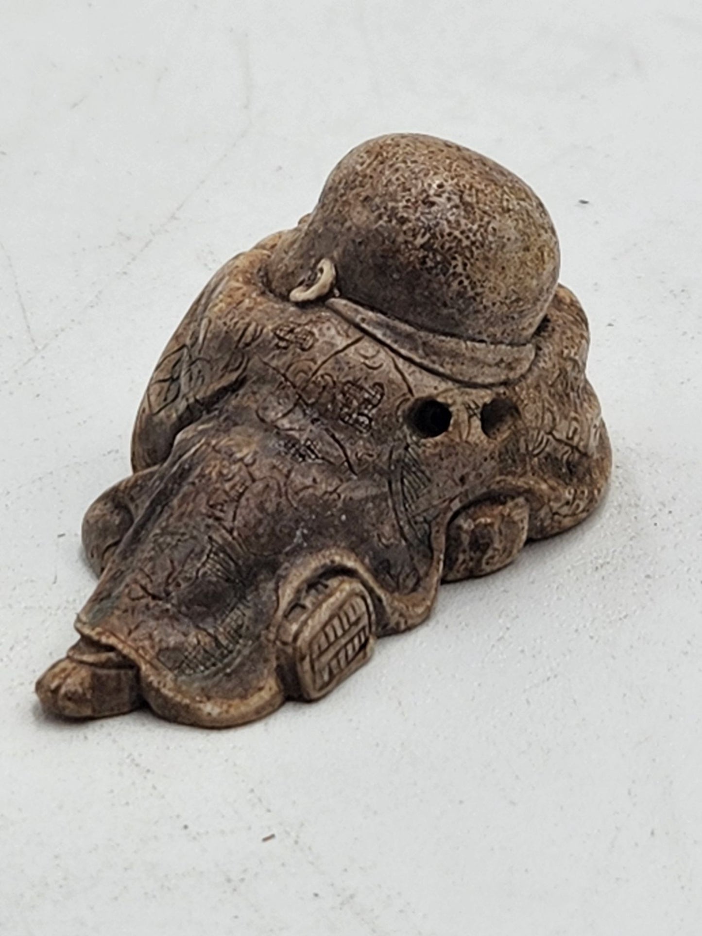 Netsuke Figurine 02 Kid Sleeping on a Bell