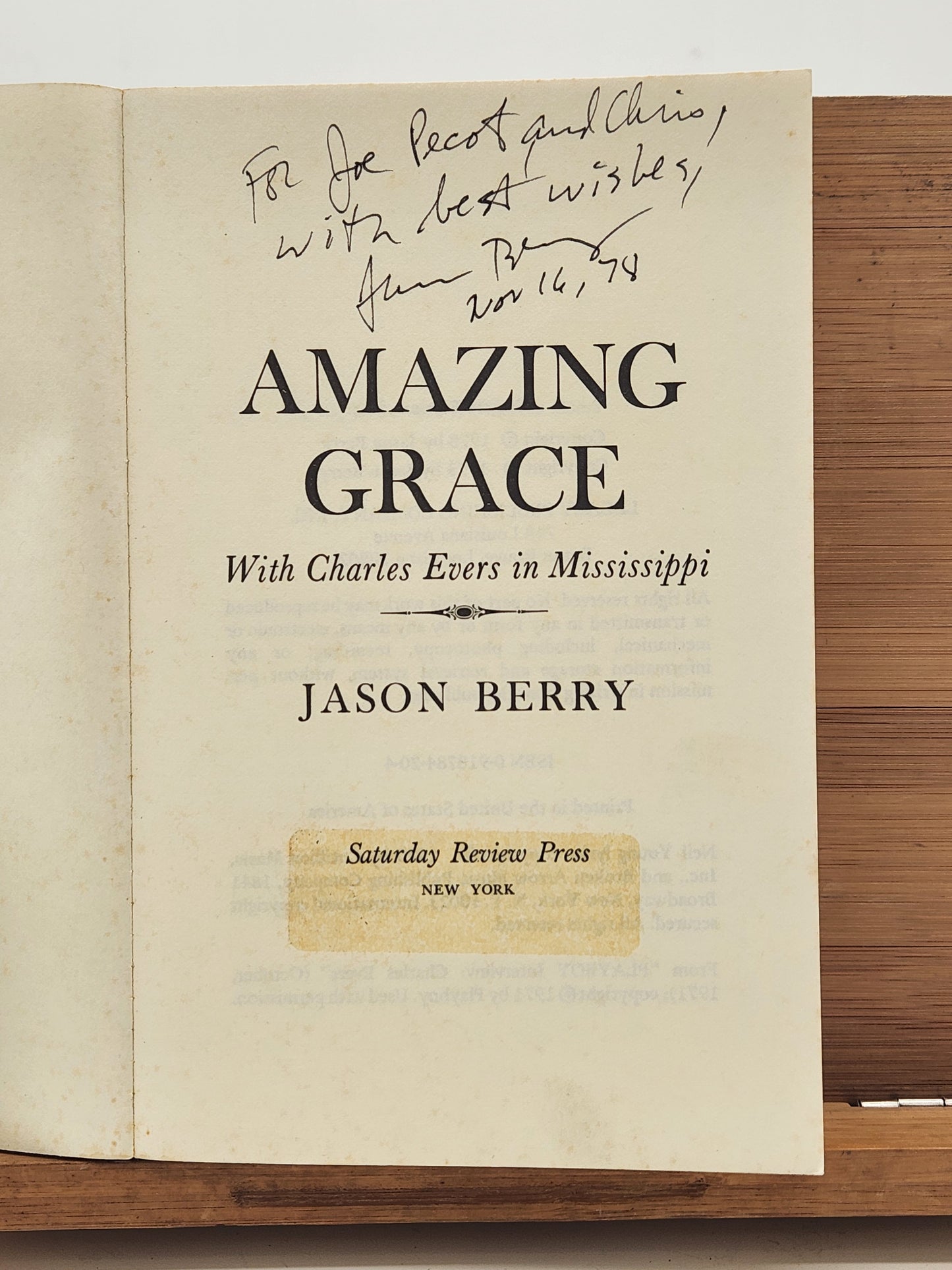 Signed 1978 2nd edition of Jason Berry’s Amazing Grace, chronicling Charles Evers’s historic Mississippi campaign.
