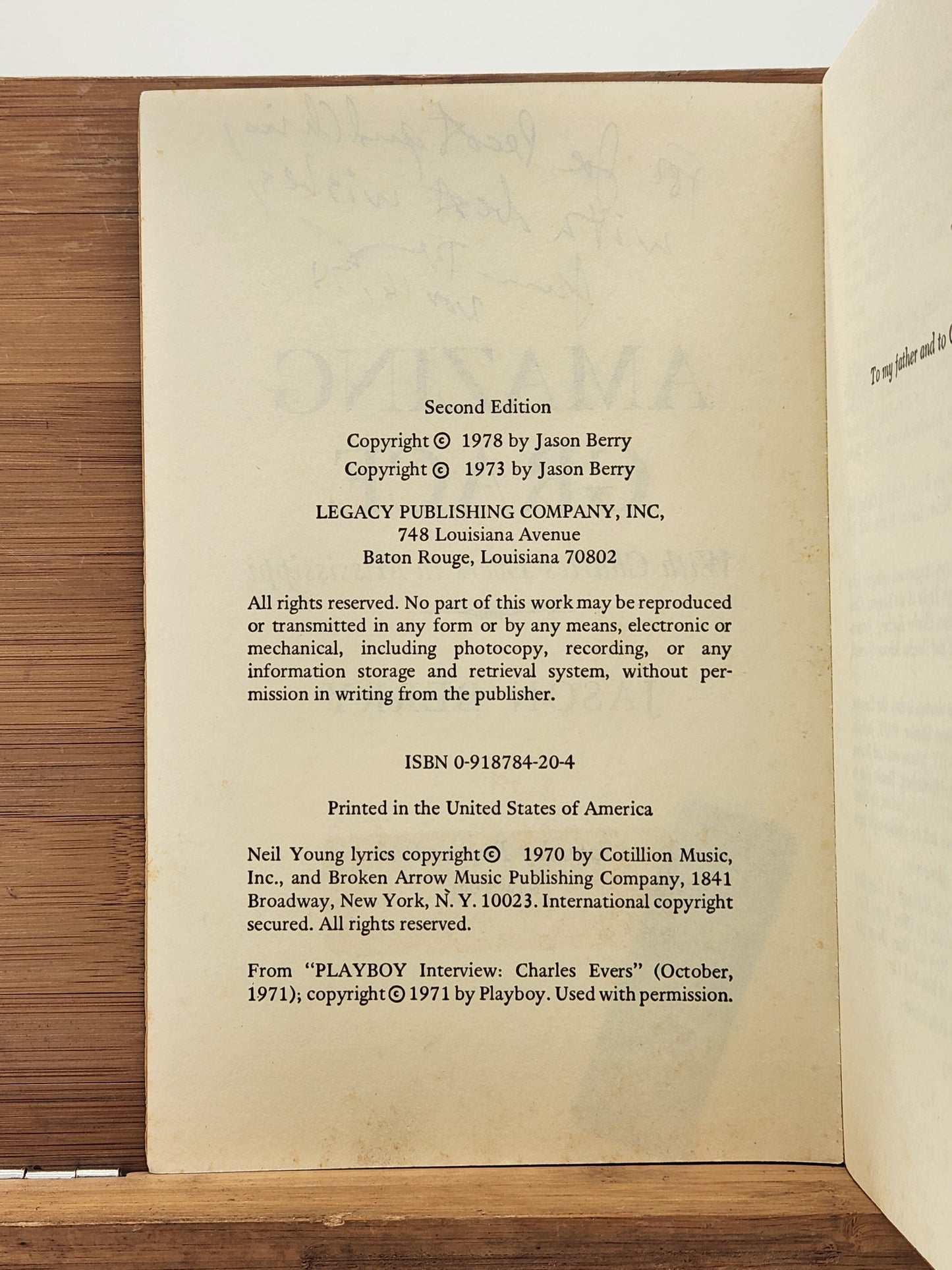 Signed 1978 2nd edition of Jason Berry’s Amazing Grace, chronicling Charles Evers’s historic Mississippi campaign.
