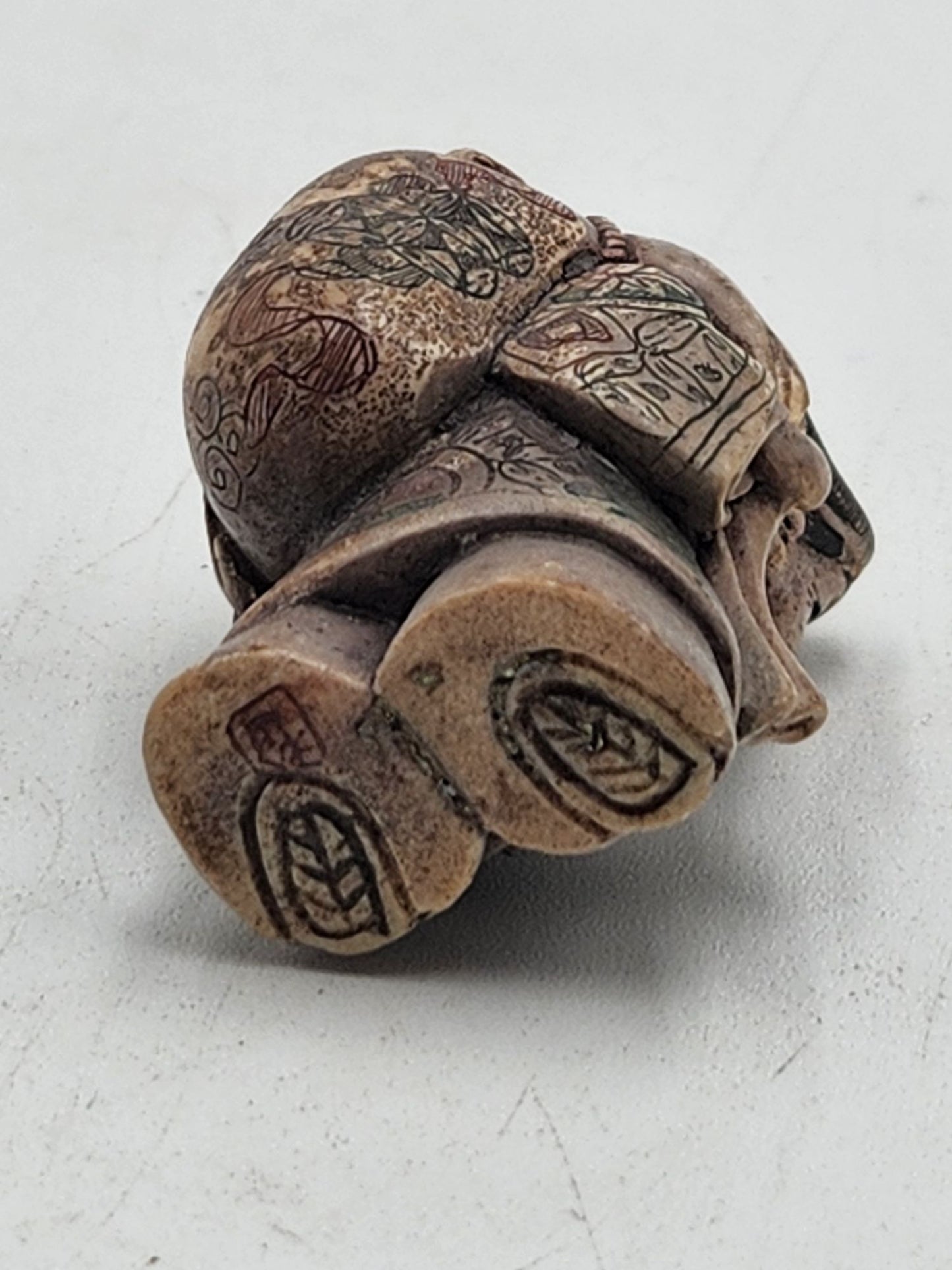 Netsuke Figurine 07 Guy Standing Carrying a Bag