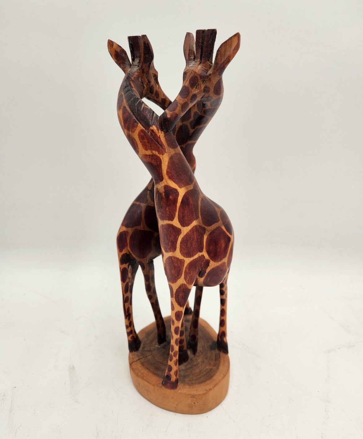 Hand made giraffe statue